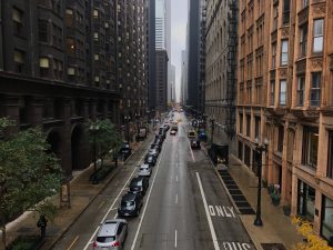 This image shows Dearborn Street in Chicago looking in the direct traffic is traveling.