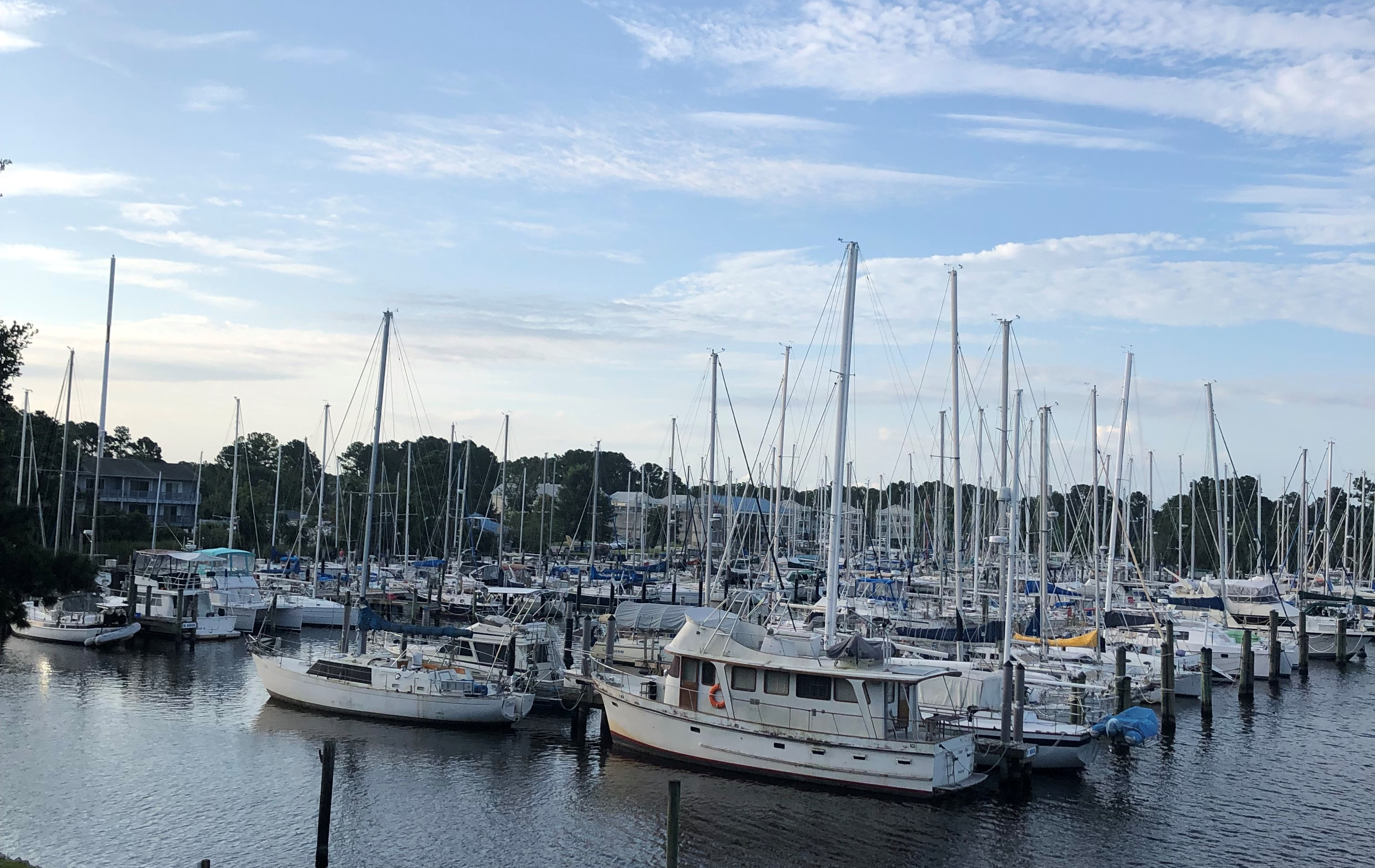 This image shows boats in a harbor in Carolina Beach, North Carolina.