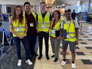 RSGers conduct fieldwork as a team while wearing reflective vests and badging in Tampa, Florida.