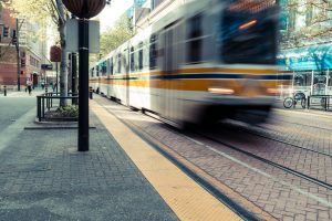 Image of tram in downtown street.