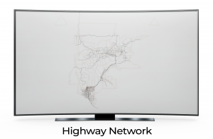 Outline of a highway network displayed on a curved screen.