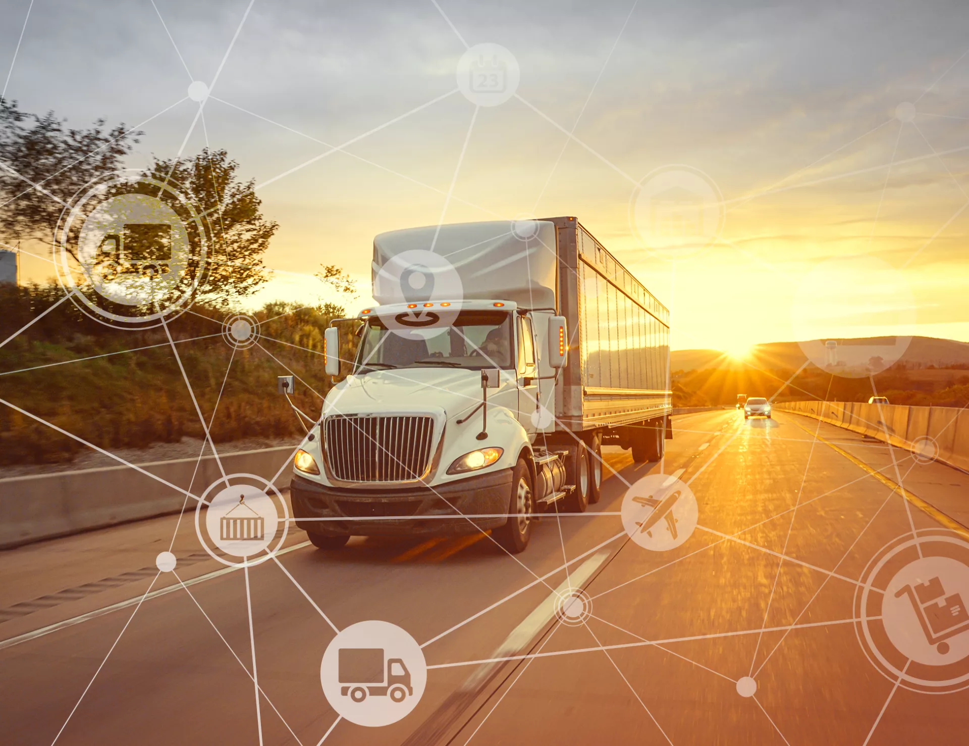 This image shows a truck on the highway with a sunset behind it. The image also has various icons on top of it to represent the national supply chain.