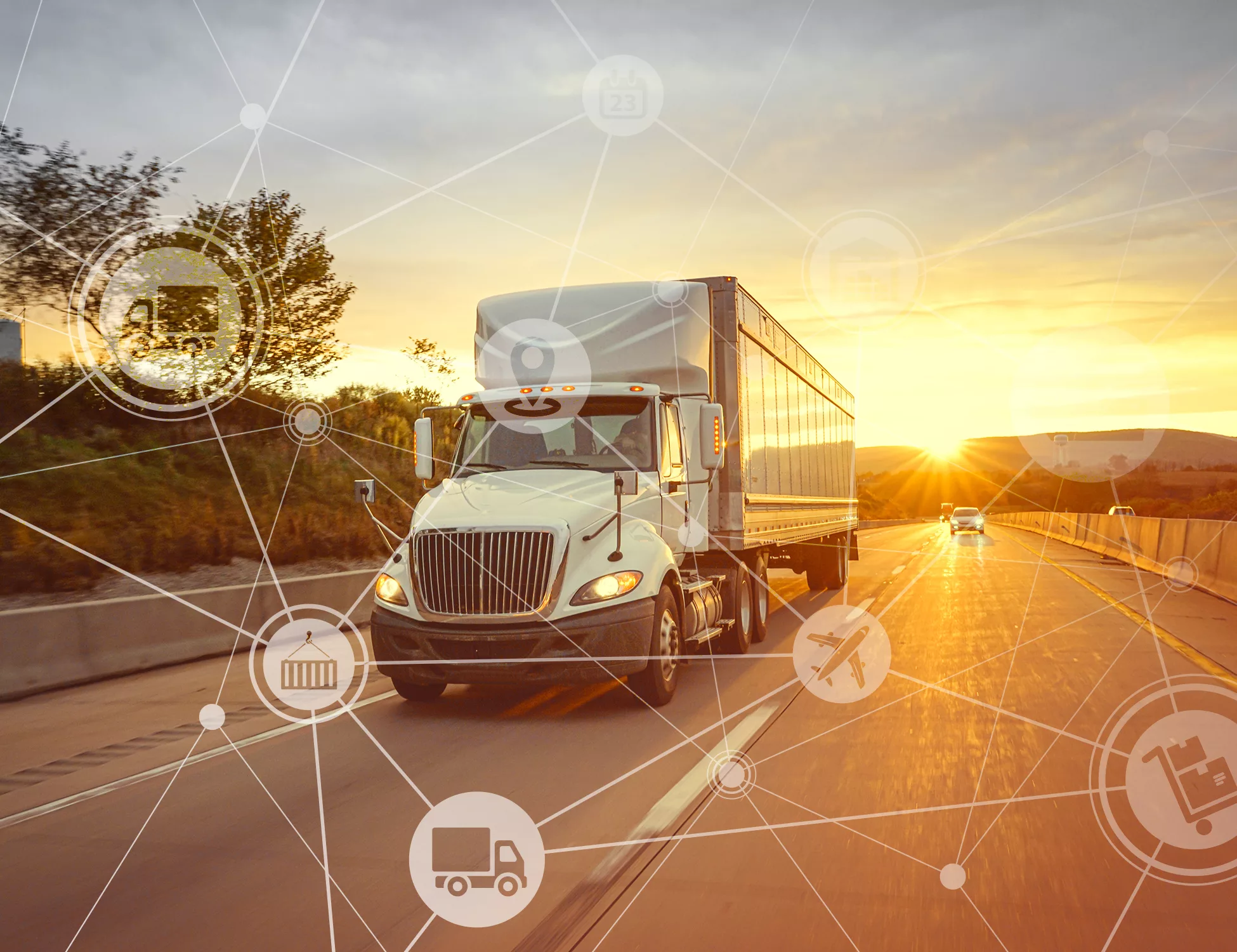 This image shows a truck on the highway with a sunset behind it. The image also has various icons on top of it to represent the national supply chain.